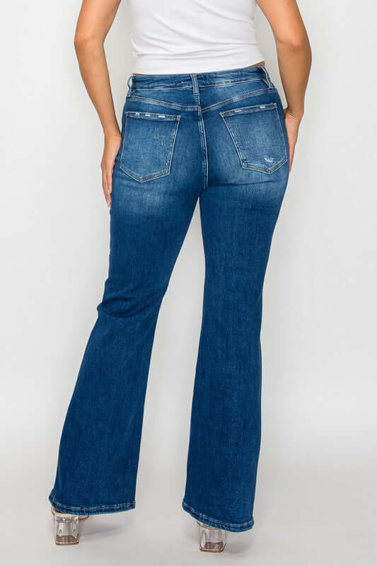 Women's back view of bytos High Rise Bootcut Jeans in classic blue with pockets for a stylish and comfortable fit.