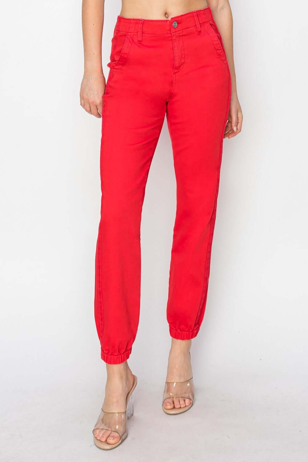 Red high-waisted jogger jeans showcasing relaxed fit and flattering style.