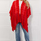 JUSTIN TAYLOR Pom-Pom Asymmetrical Poncho Cardigan in Red at Bella Road