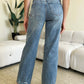 Back view of High Waist Distressed Straight Judy Blue Jeans showing flattering fit and distressed detailing.