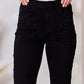 Woman wearing Judy Blue Rhinestone Embellished Slim Jeans with high waist and pocketed design.