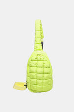 Bright yellow Bella Road Quilted Nylon Crossbody Bag, medium size, side view. Perfect for stylish adventures and vibrant outfits.