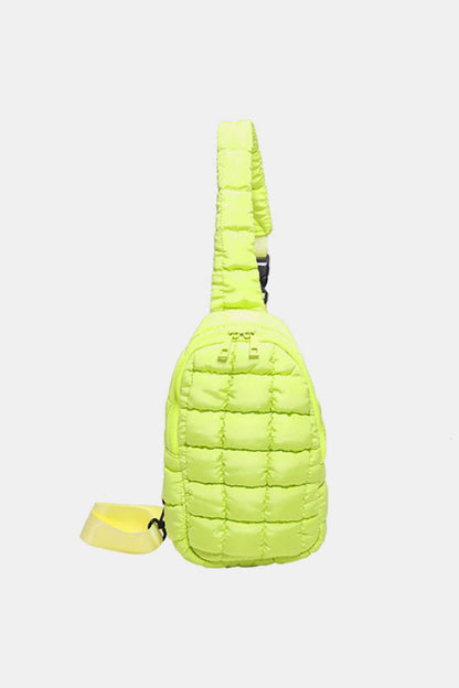 Bright yellow Bella Road Quilted Nylon Crossbody Bag, medium size, side view. Perfect for stylish adventures and vibrant outfits.