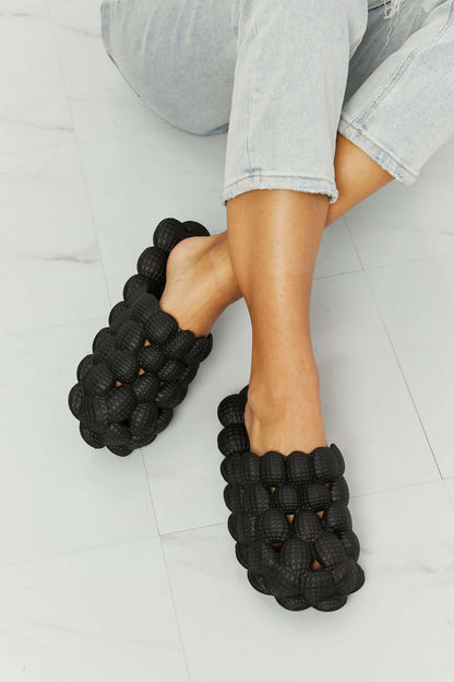 NOOK JOI Laid Back Bubble Slides in Black at Bella Road