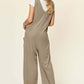 DOUBLE TAKE Full Size Sleeveless Wide Leg Jumpsuit with Pockets at Bella Road