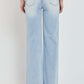 Back view of RISEN Full Size Wide Leg V Dipped Front Waist Jeans in light denim, showcasing wide-leg fit and rear pocket design.