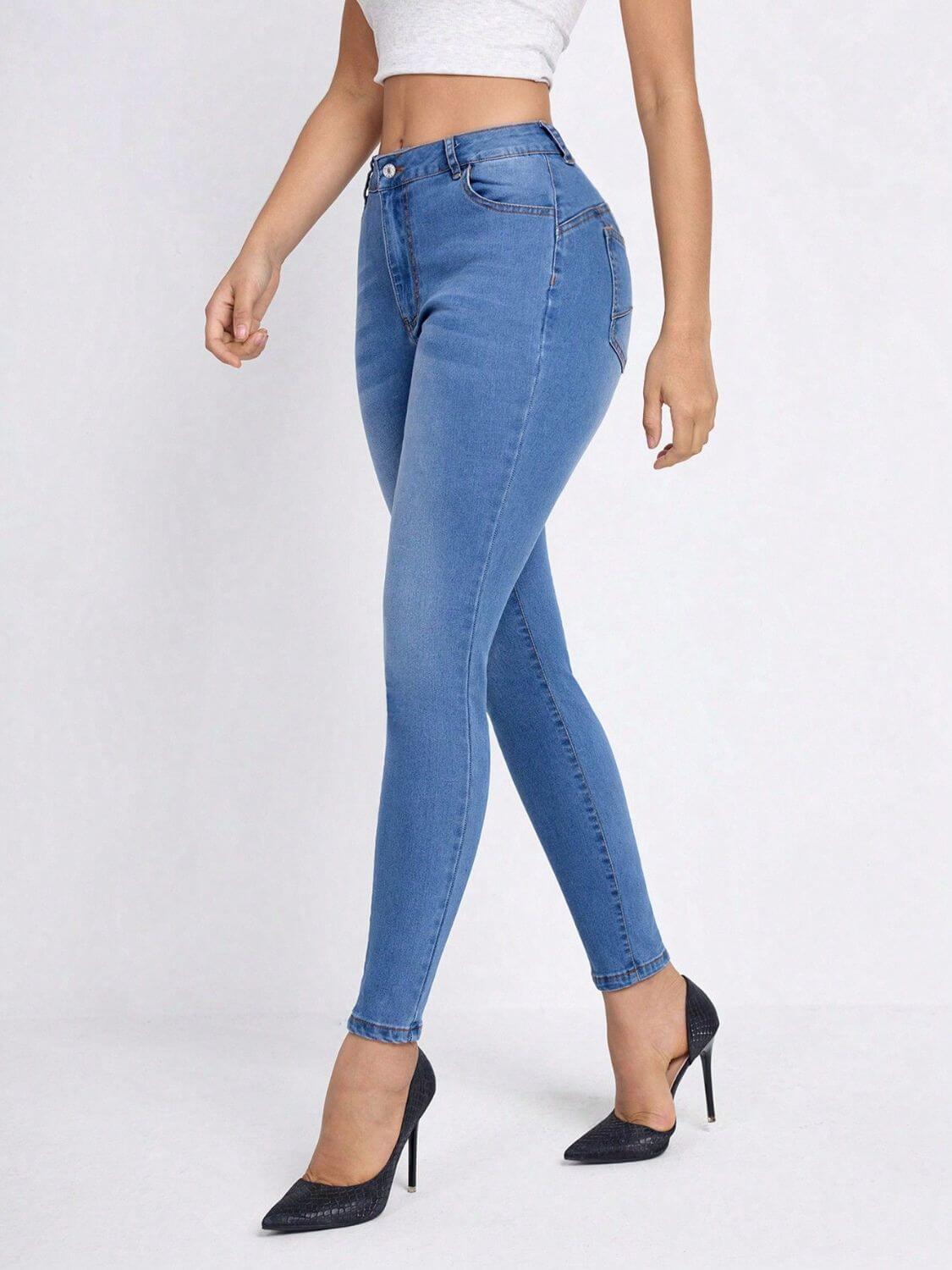 Bella Road High Rise Skinny Jeans with pockets in blue, showing side view on model with moderate stretch and comfortable fit