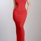 Woman wearing Basic Bae Built-In Shapewear Sleeveless Maxi Dress in red, showcasing sleek silhouette and comfortable fit.