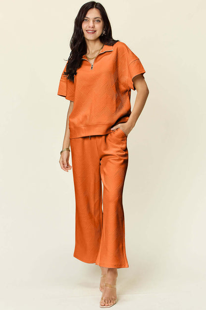 DOUBLE TAKE Full Size Texture Half Zip Short Sleeve Top and Pants Set at Bella Road