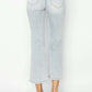 RISEN full size mid rise cropped flare jeans rear view in light wash denim highlighting trendy flare and modern cropped length