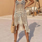 Openwork scoop neck spaghetti strap cover-up dress in intricate acrylic crochet design, worn casually with a woven handbag