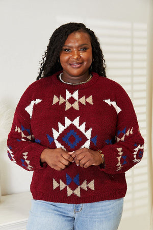 Woman wearing a cozy HEYSON Aztec soft fuzzy sweater with vibrant patterns.