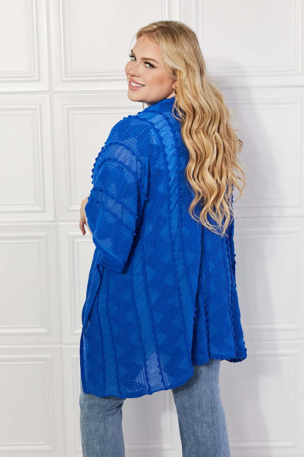 JUSTIN TAYLOR Pom-Pom Asymmetrical Poncho Cardigan in Blue at Bella Road