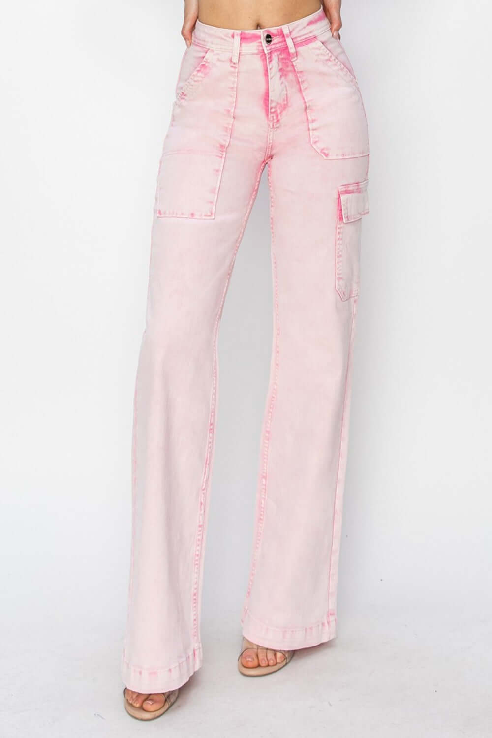 Pink high-rise wide leg cargo pocket jeans with trendy design and a relaxed fit for a stylish and practical wardrobe addition.