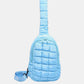 Blue Bella Road Quilted Nylon Crossbody Bag with a puffy design, showcasing a stylish and lightweight fashion accessory.