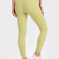 Millennia Highly Stretchy Wide Waistband Yoga Leggings in soft green, showcasing a flattering fit from the back. Perfect for yoga!