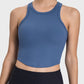 Millennia Round Neck Racerback Active Tank in blue, featuring a comfortable, stretchy design for activewear.