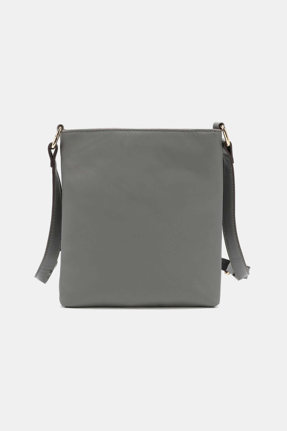 Nicole Lee USA Nikky Crossbody Bag in smooth eco-leather, back view showing slimline design and adjustable strap.