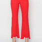 Bright red Risen Jeans raw hem bootcut jeans with pockets, flattering petite fit, edgy and functional women's denim style.