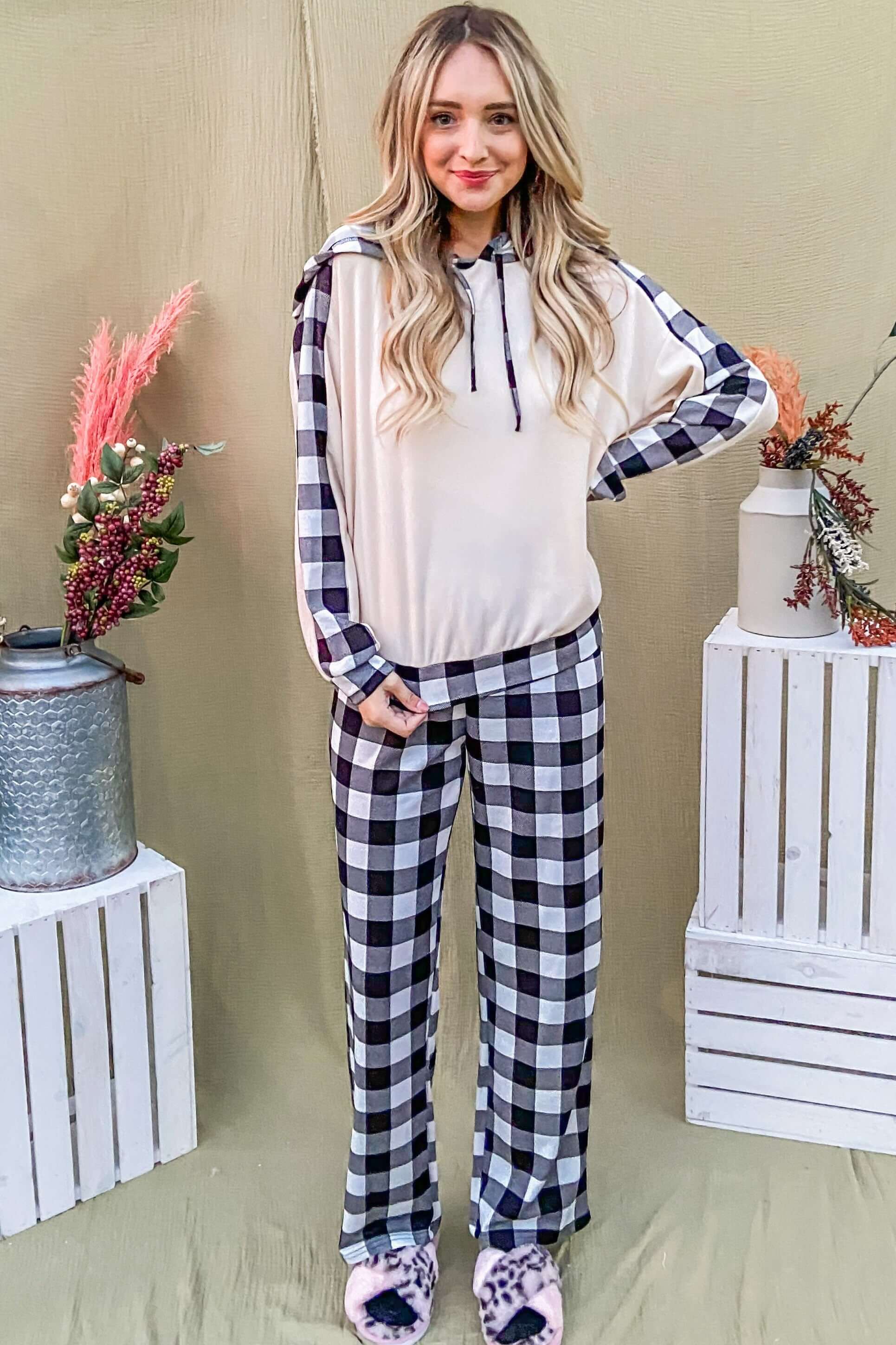 Model showcasing the And The Why drawstring hooded top and plaid pants lounge set, perfect for stylish comfort.