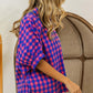 Woman wearing a Plaid Button Up Dolman Sleeve Shirt with blue and pink checkered pattern, paired with white frayed shorts.