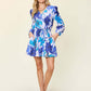 DOUBLE TAKE Full Size Floral Long Sleeve Romper with Pockets at Bella Road