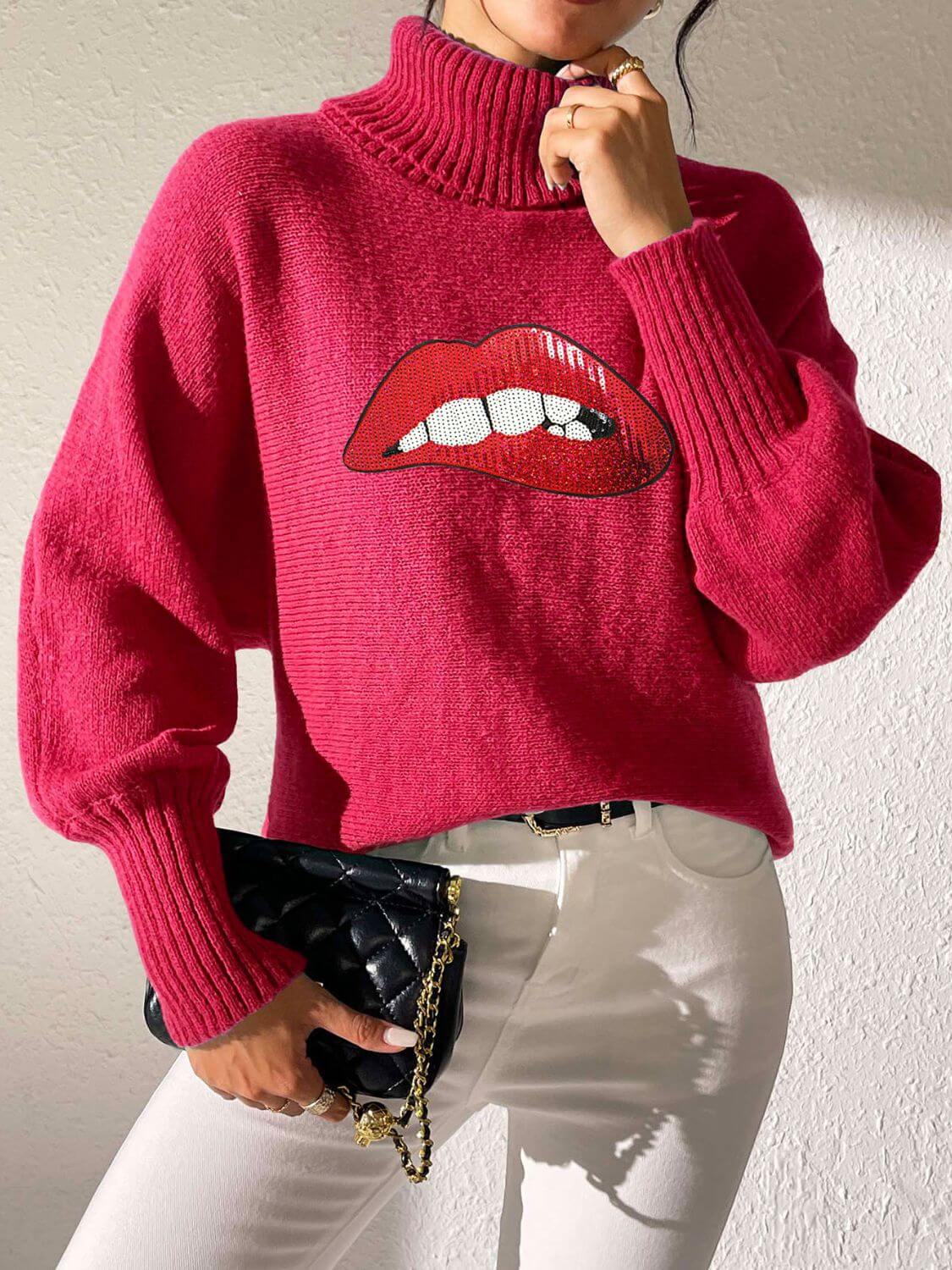 Bella Road Lip Turtleneck Sweater in pink with bold lip design, playful and stylish, perfect for unique style statements.