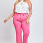 Smiling woman wearing a white halter top and pink Mid-Rise Hyperstretch Cropped Straight Pants from YMI Jeans.