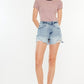 Kancan distressed high waist denim shorts with pockets, styled with a ribbed top and sneakers.