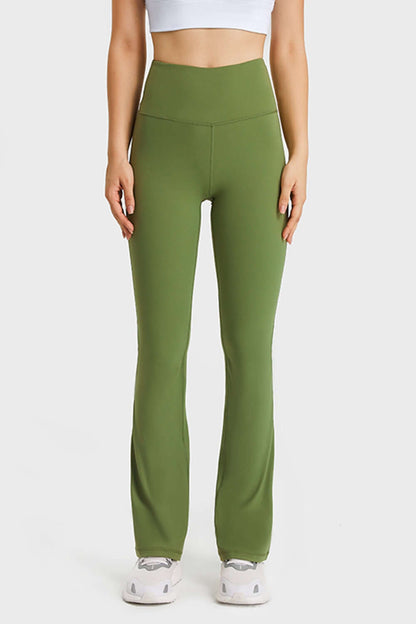 Millennia Elastic Waist Flare Yoga Pants in green, perfect for yoga and workouts with ultimate comfort and style.