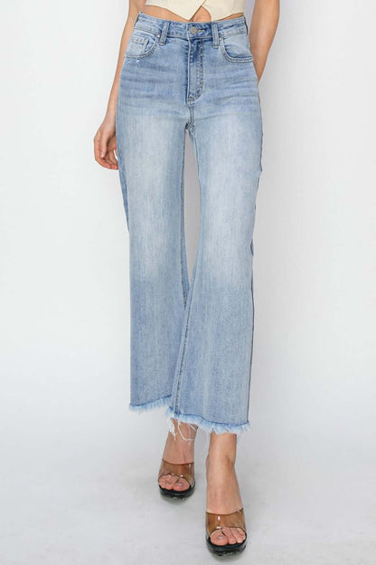 High rise crop wide fray hem jeans with a trendy look, showcasing a flattering silhouette and relaxed wide leg style.