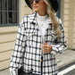 Woman wearing Bella Road Plaid Collared Neck Long Sleeve Jacket with black and white pattern, hat, sunglasses, and jeans.