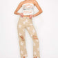 High Rise Star Printed Frayed Hem Jeans with Trendy Star Pattern in a Stylish Outfit