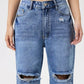 Bella Road Distressed Jeans with Pockets showcasing edgy distressing and comfy fit, perfect for elevating casual looks.