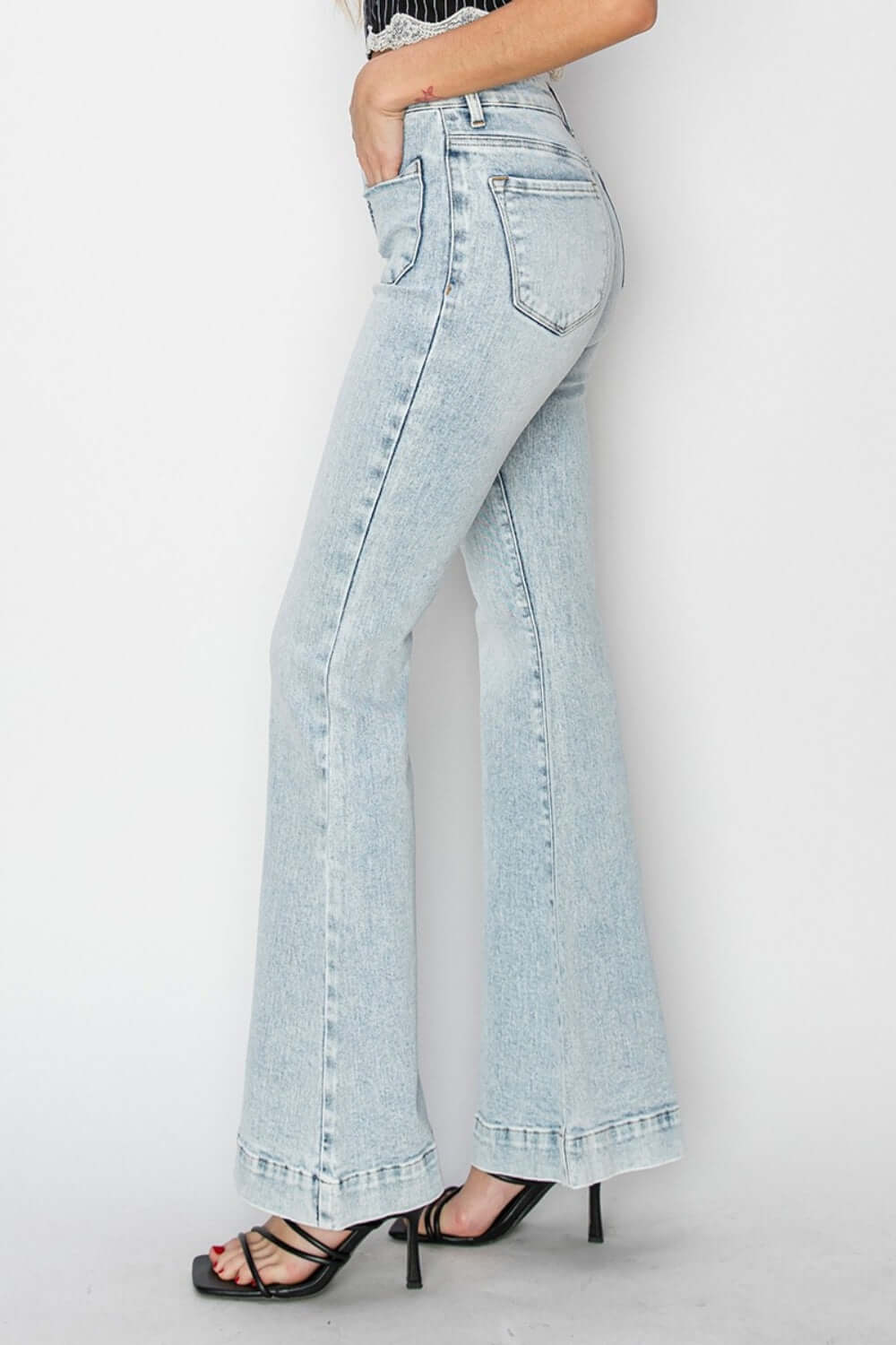 High Rise Front Patch Pocket Flare Jeans in light denim with a stylish fit by Risen Jeans