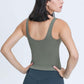 Model showcasing the back of a green Millennia V Neck Active Tank, perfect for stylish workouts and athleisure wear.