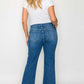 Woman showcasing the back of bytos Full Size Cat's Whiskers Mid Rise Ankle Jeans with a casual white t-shirt.