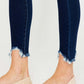 High Rise Frayed Ankle Skinny Jeans with distressed hem paired with beige flats