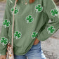 Model wearing a Bella Road long sleeve sweatshirt with green sequin clovers, perfect for St. Patrick's Day style.