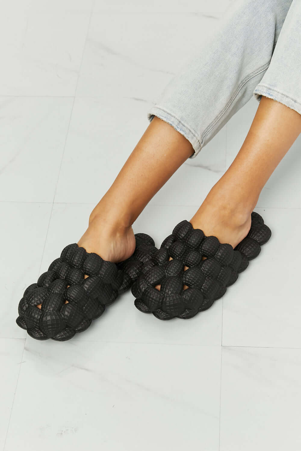 NOOK JOI Laid Back Bubble Slides in Black at Bella Road