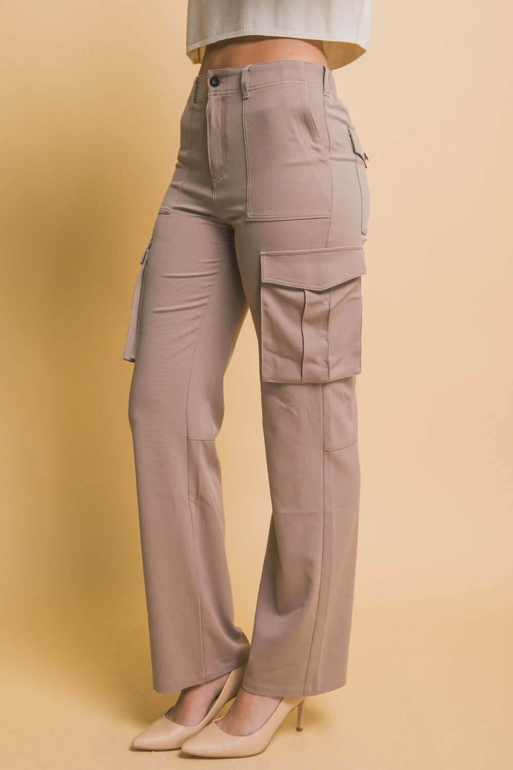 High Rise Cargo Pants with Pockets, featuring a flattering silhouette and practical design for a trendy utilitarian style.