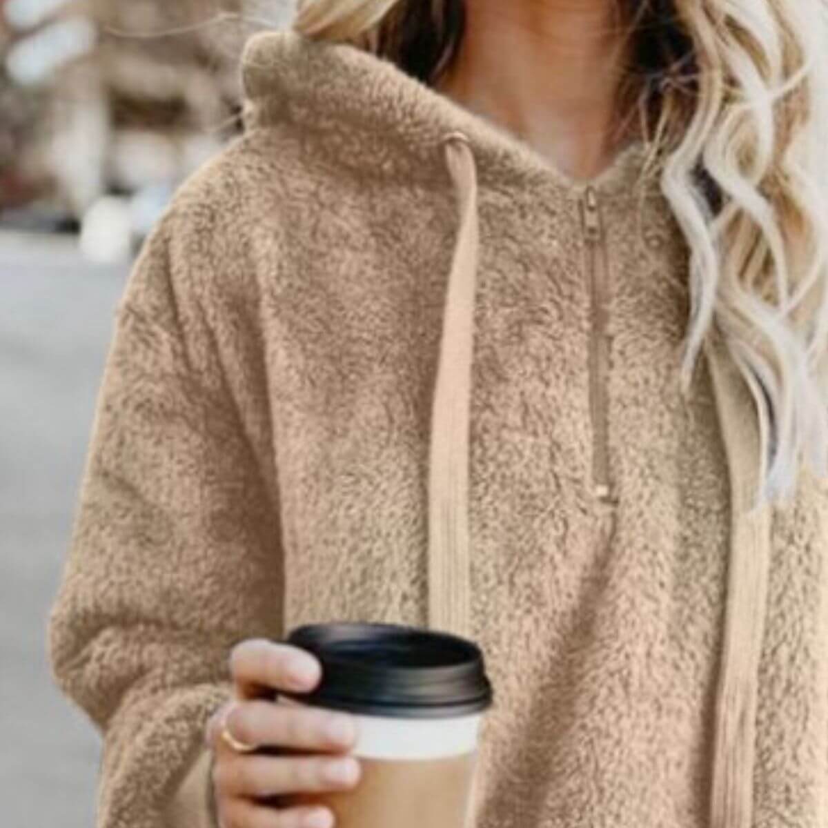 Cozy Bella Road teddy hoodie with drawstring, holding a coffee cup, perfect for casual outings.