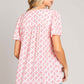 Back view of a woman wearing a pink and white Slit Printed V-Neck Flutter Sleeve Blouse with a charming printed design and graceful flutter sleeves