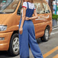 Trendy Bella Road wide strap wide leg denim overalls, perfect for stylish adventures and everyday comfort.