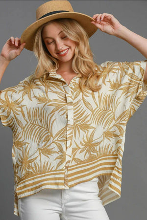 Umgee Tropical Print Button Down Shirt in vibrant gold, perfect for a stylish island-inspired look.