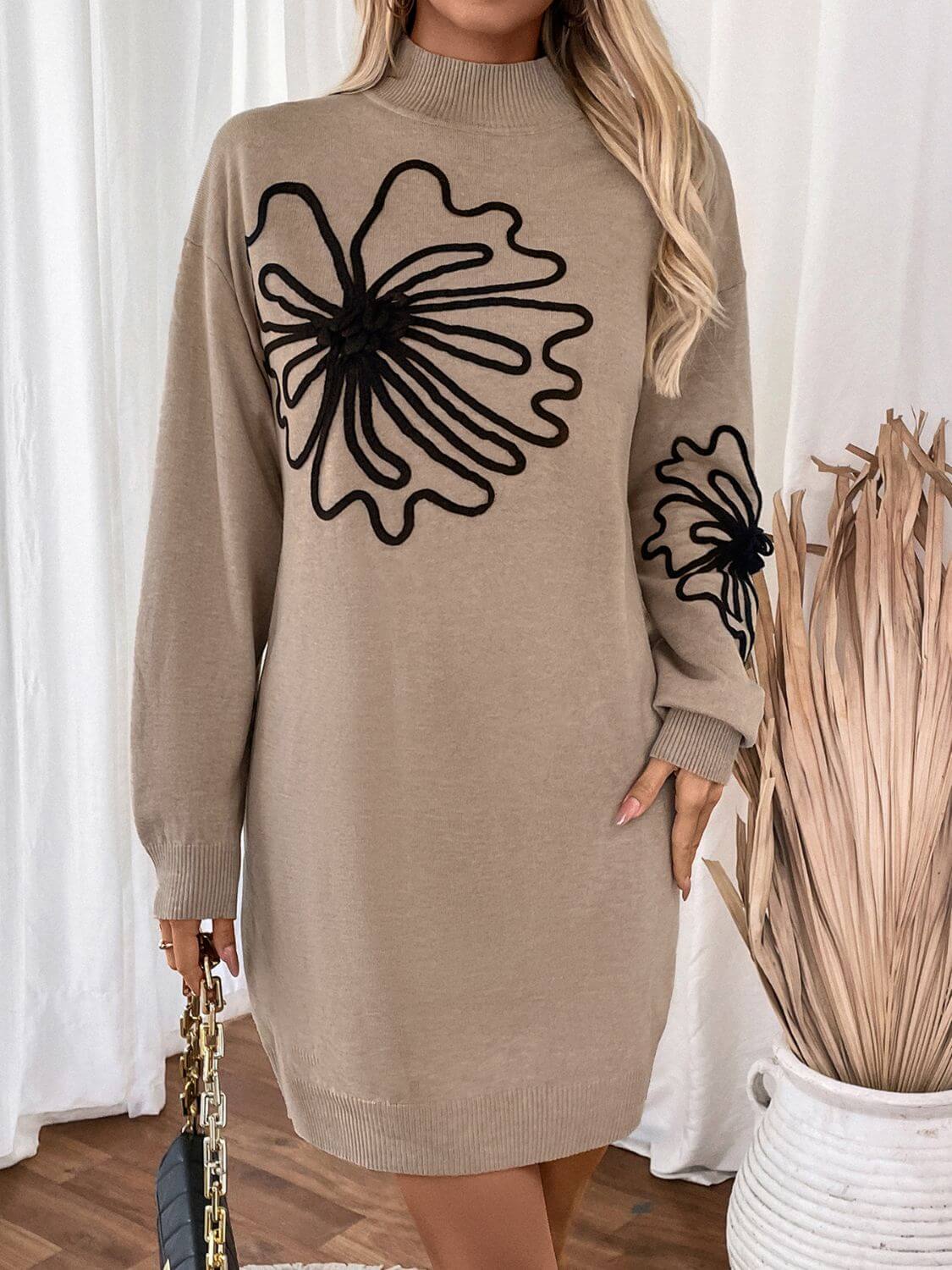 Perfee Flower Mock Neck Long Sleeve Sweater Dress featuring intricate black floral patterns and a cozy design