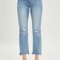 High rise distressed cropped straight Risen jeans with frayed hems, perfect for showcasing trendy shoes and adding an edgy touch to outfits.