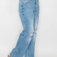 Woman showcasing bytos Full Size Distressed High Rise Straight Jeans with edgy rips and a flattering fit.