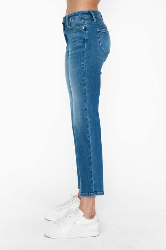 Side view of bytos Cat's Whiskers mid rise ankle jeans, highlighting the modern fit and playful style.