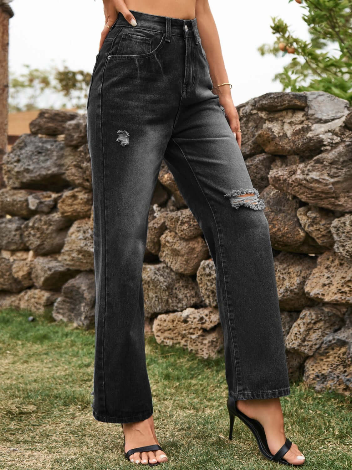 Black Bella Road Distressed Jeans with stylish pockets and a slightly stretchy fit, perfect for adding edge to any wardrobe.